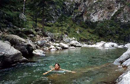 Celine is swimming in a river at Arshan, photo by WayToRussia.Net