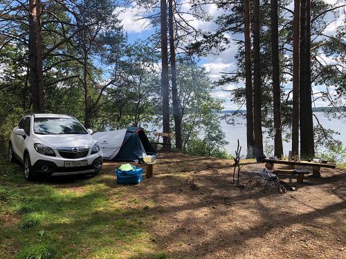 Wild camping at Korobozha lake, Novgorod region in Russia