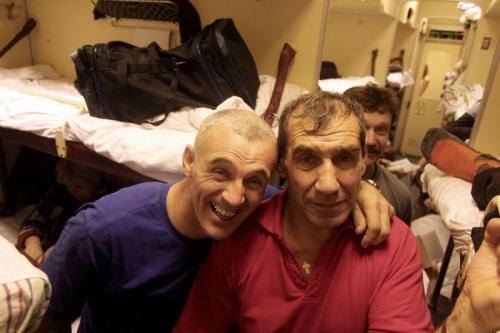 Two happy Russian guys on a Trans-Siberian train